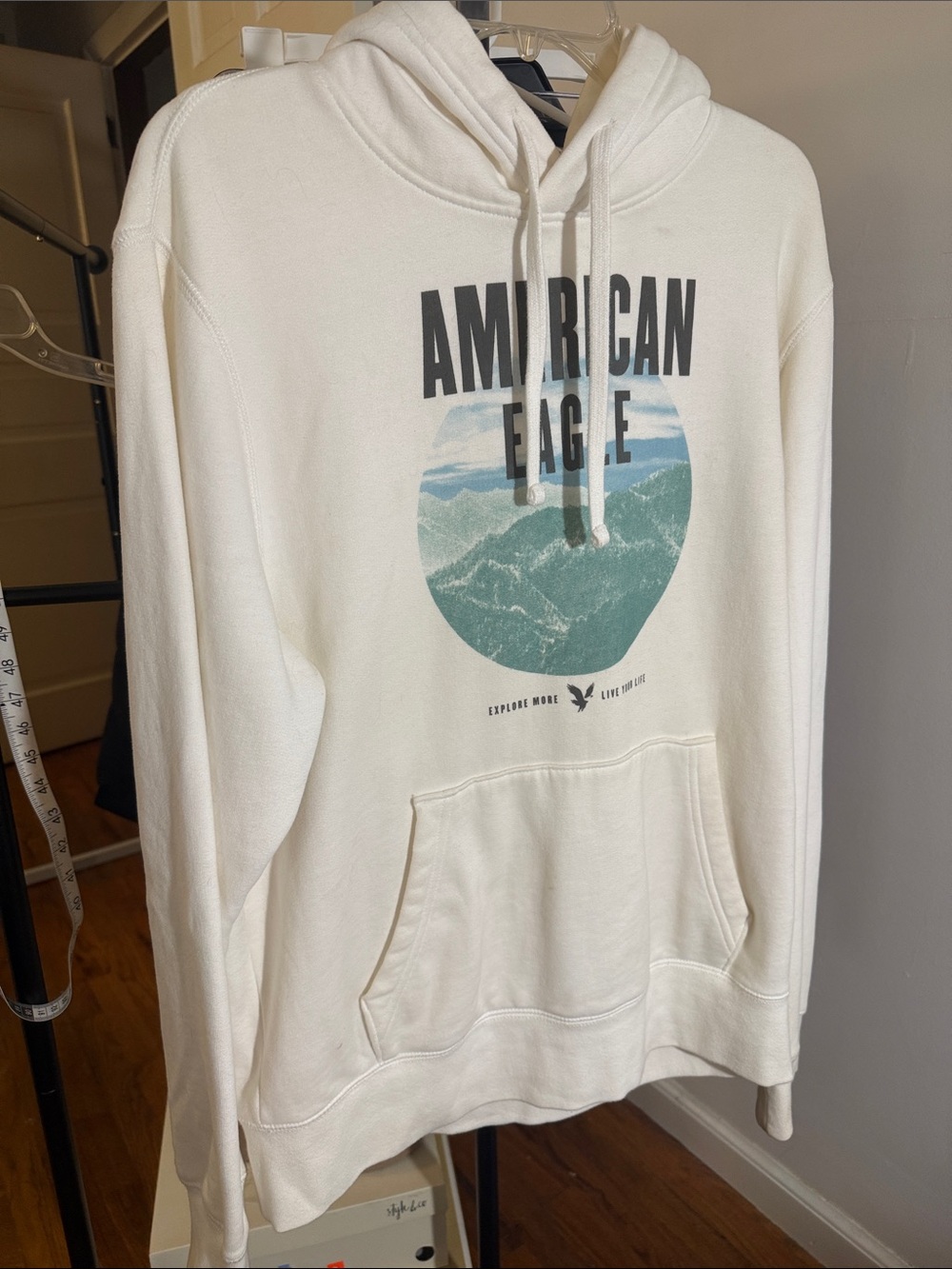 American Eagle Cream Hoodie with Teal Mountain Graphic